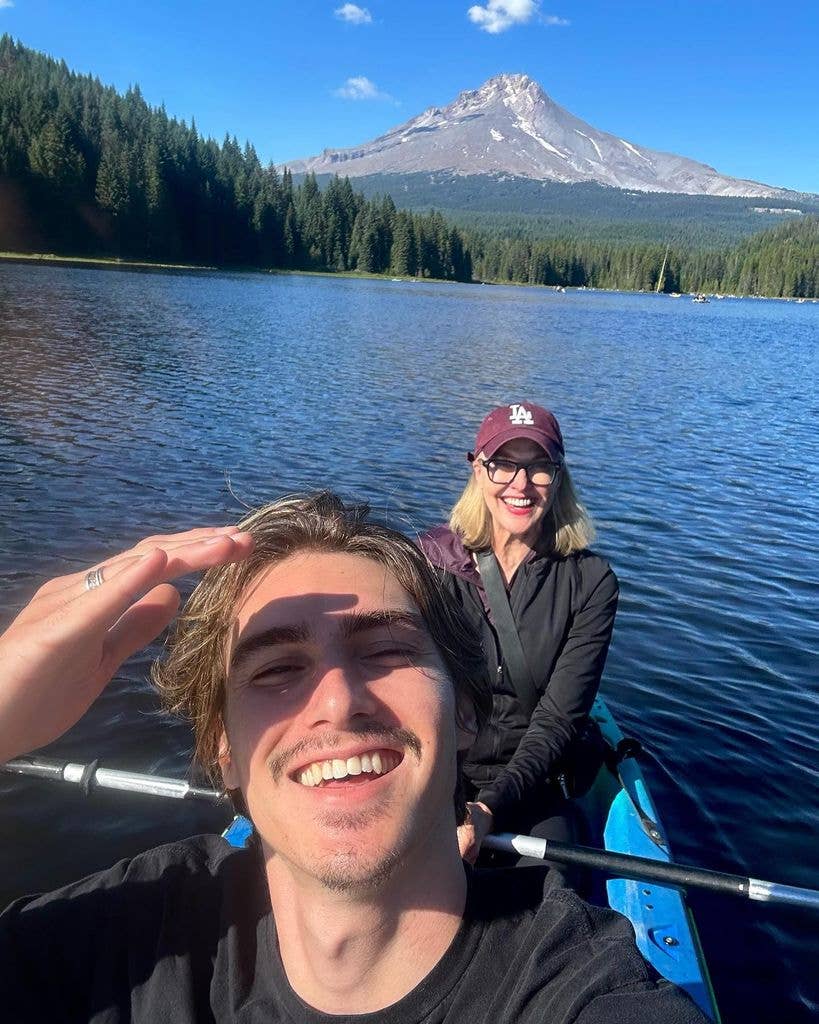 photo of brenda strong and zak henri in a boat