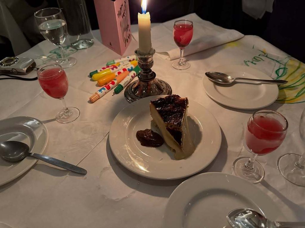 food on plates in dimly lit restaurant