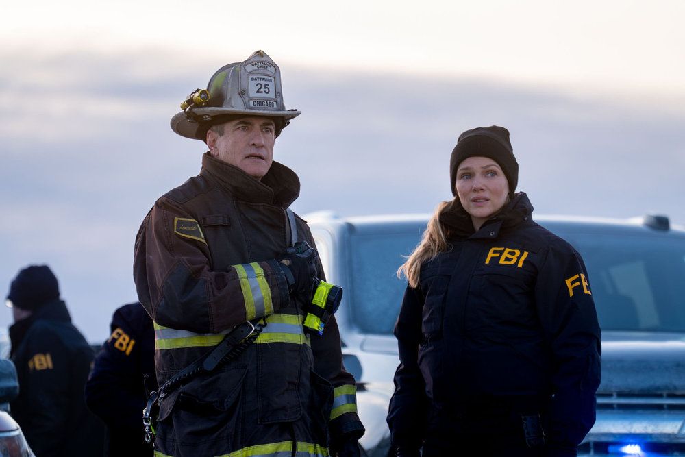 Dermot Mulroney as Chief Dom Pascal, Tracy Spiridakos as Hailey Upton in the 2026 One Chicago crossover