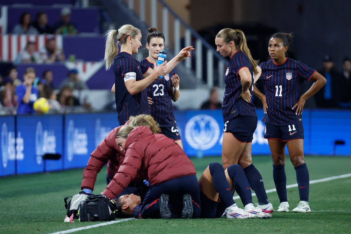 The team gathered around as the crowd went silent