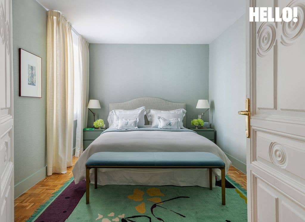 One of the bedrooms, decorated in pale green tones inside designer Silvia Tcherassi's Madrid home 