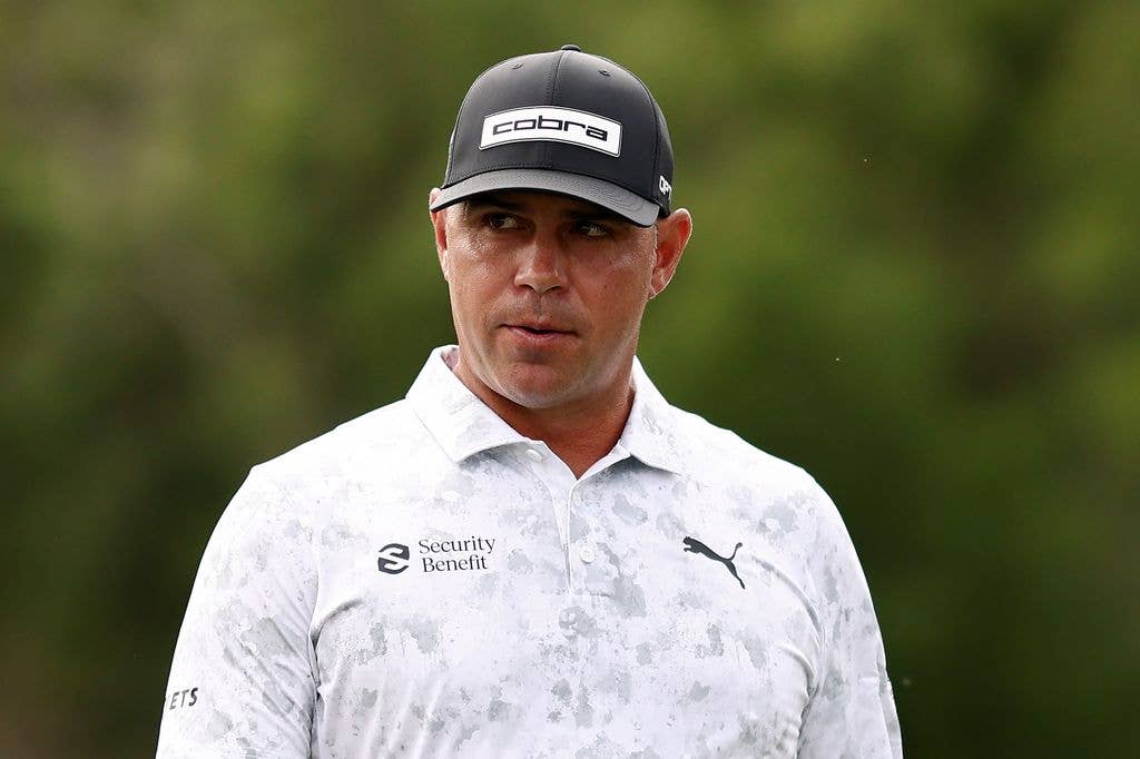 Gary on the golf course taking a deep breath