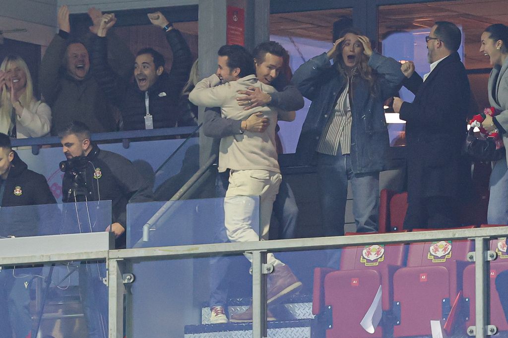 Rob McElhenney, Hollywood actor and co-owner of Wrexham FC, and Ryan Reynolds, Hollywood actor and co-owner of Wrexham FC, celebrates their side's first goal during the Emirates FA Cup Fifth Round match between Wrexham and Chelsea 