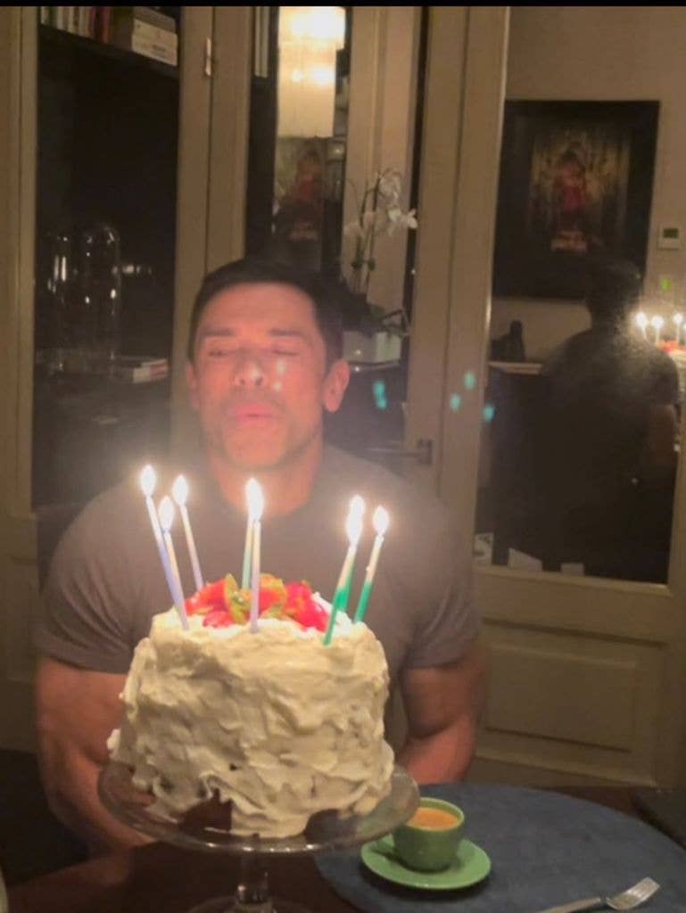 Mark Consuelos blowing out birthday cake