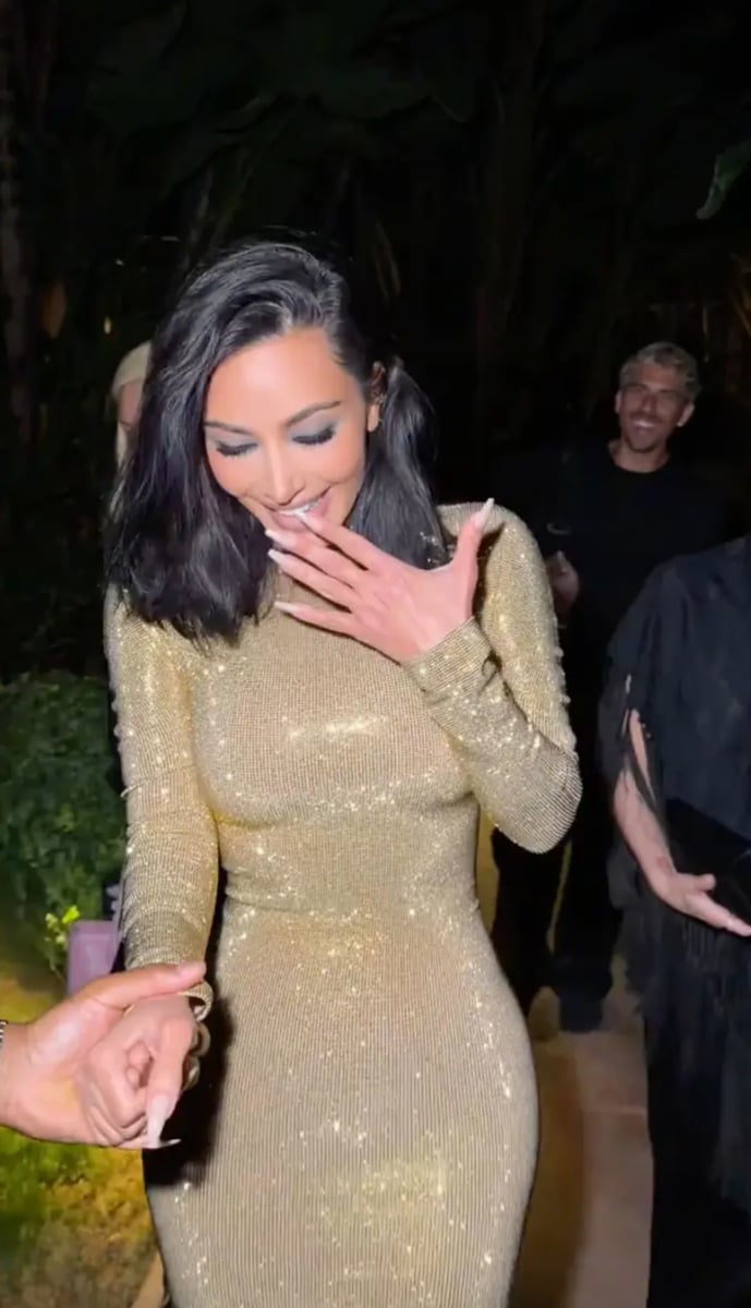 Despite the near mishap, Kardashian continued walking