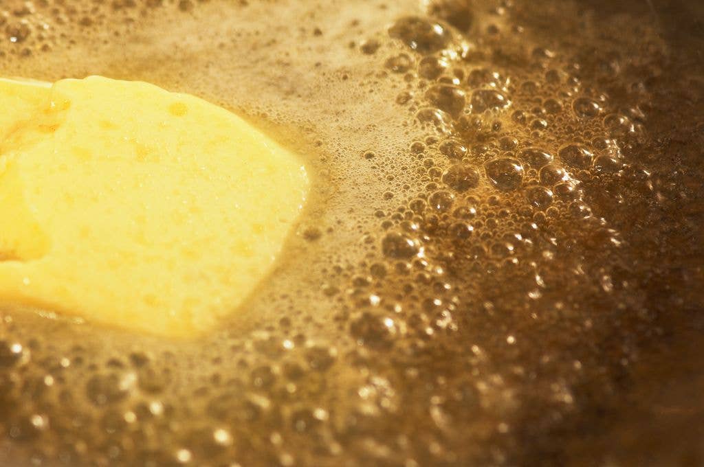 Butter melting in a pan.