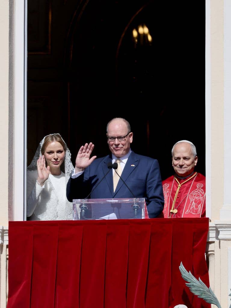 Princess Charlene of Monaco, Prince Albert II of Monaco and Pope Leo XIV greet the crowd during the Pope Leo XIV's visit to Monaco