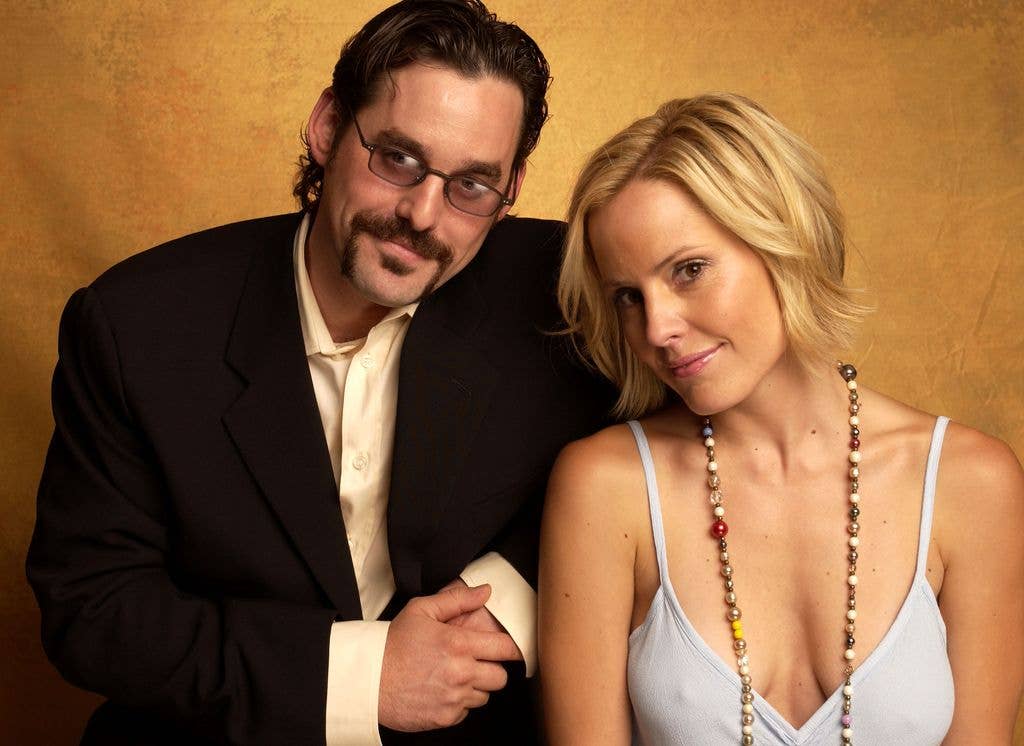 photo of nicholas brendon and emma caulfiend smiling