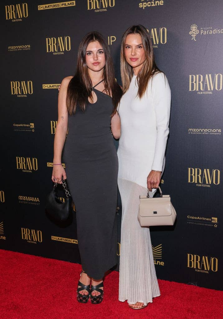Anja Ambrosio Mazur in black dress and mom Alessandra Ambrosio  in white dress