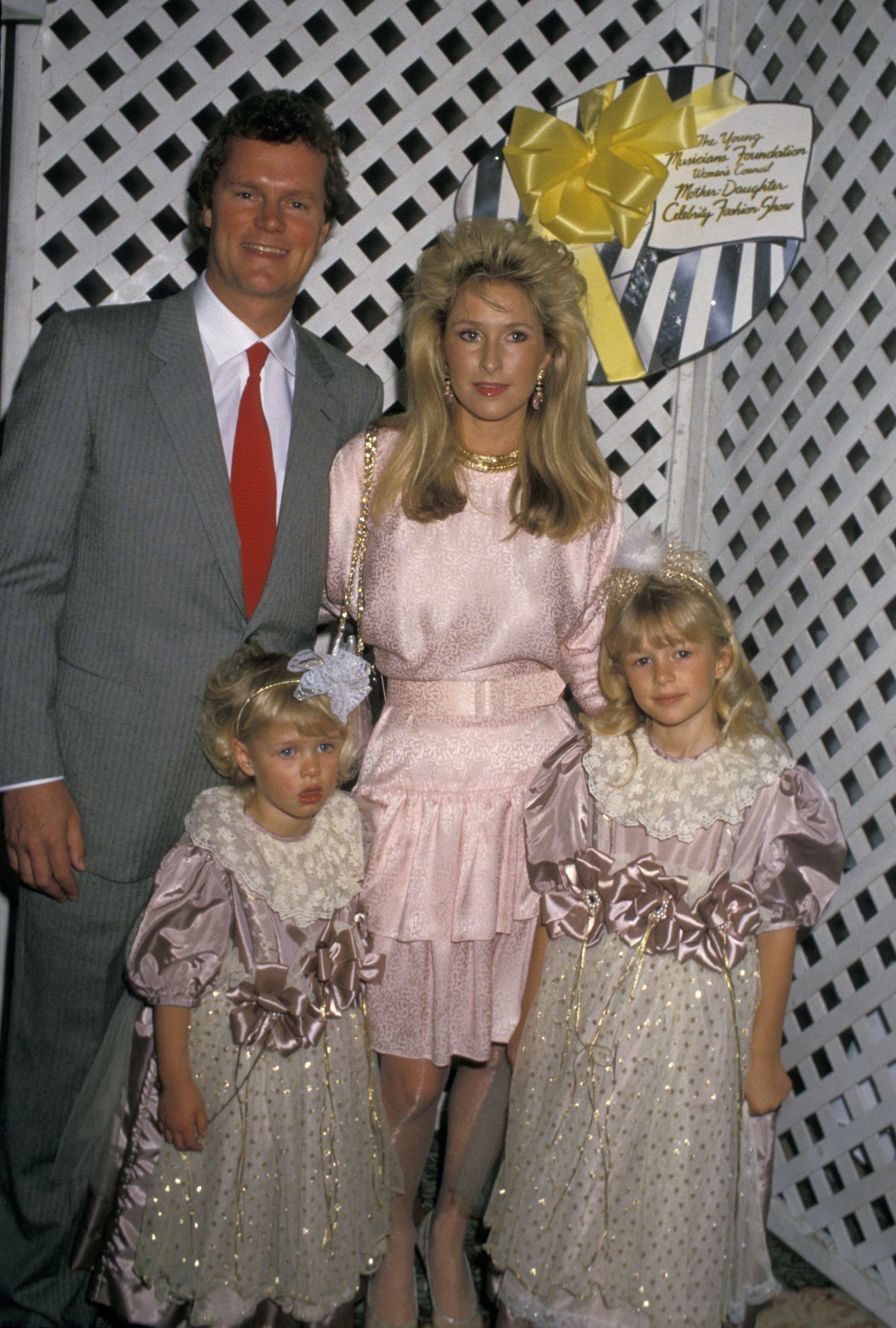 Nicky Hilton with her sister Paris, mother Kathy and father Rick Hilton