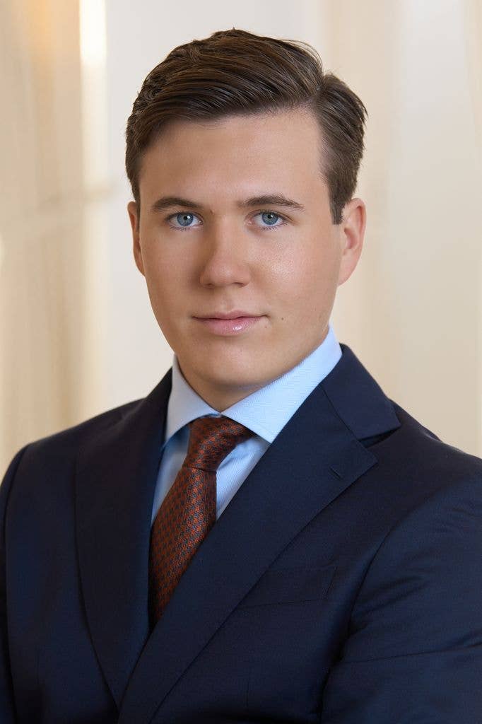 A portrait of Crown Prince Christian in a suit