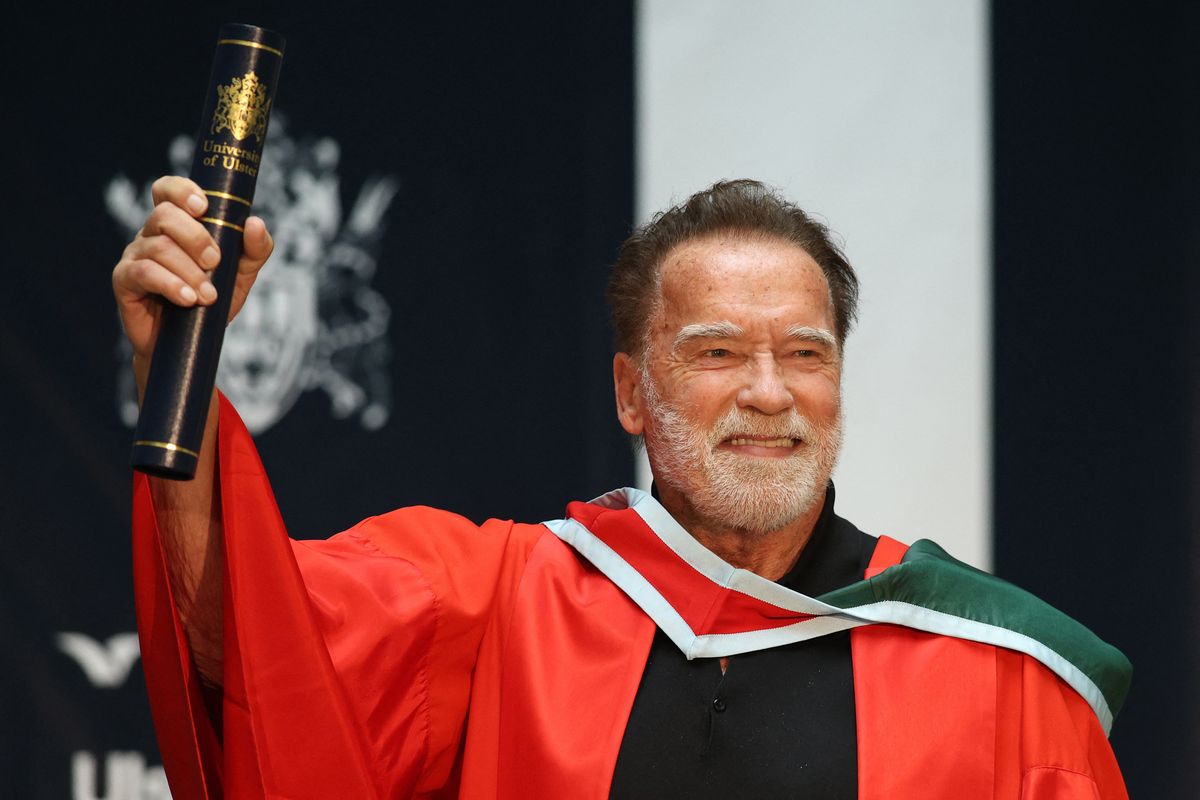 Arnold Schwarzenegger receiving an honorary doctorate from Ulster University in Belfast, Northern Ireland