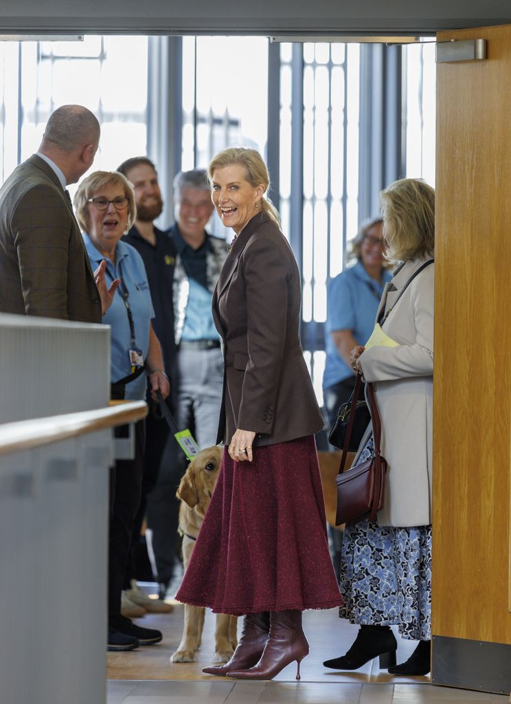 Duchess Sophie laughing in corridor with people