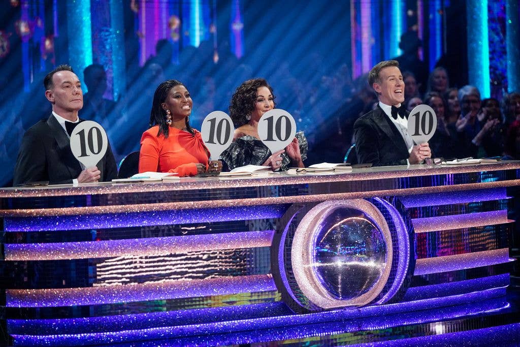 The four Strictly judges holding up 10 paddles