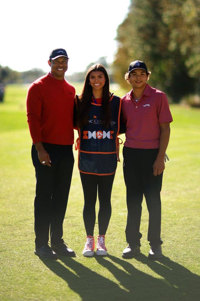 Tiger Woods of the United States with his son Charlie Woods and daughter Sam Woods stand on the first tee during the second round of the PNC Championship at Ritz-Carlton Golf Club on December 22, 2024 in Orlando, Florida