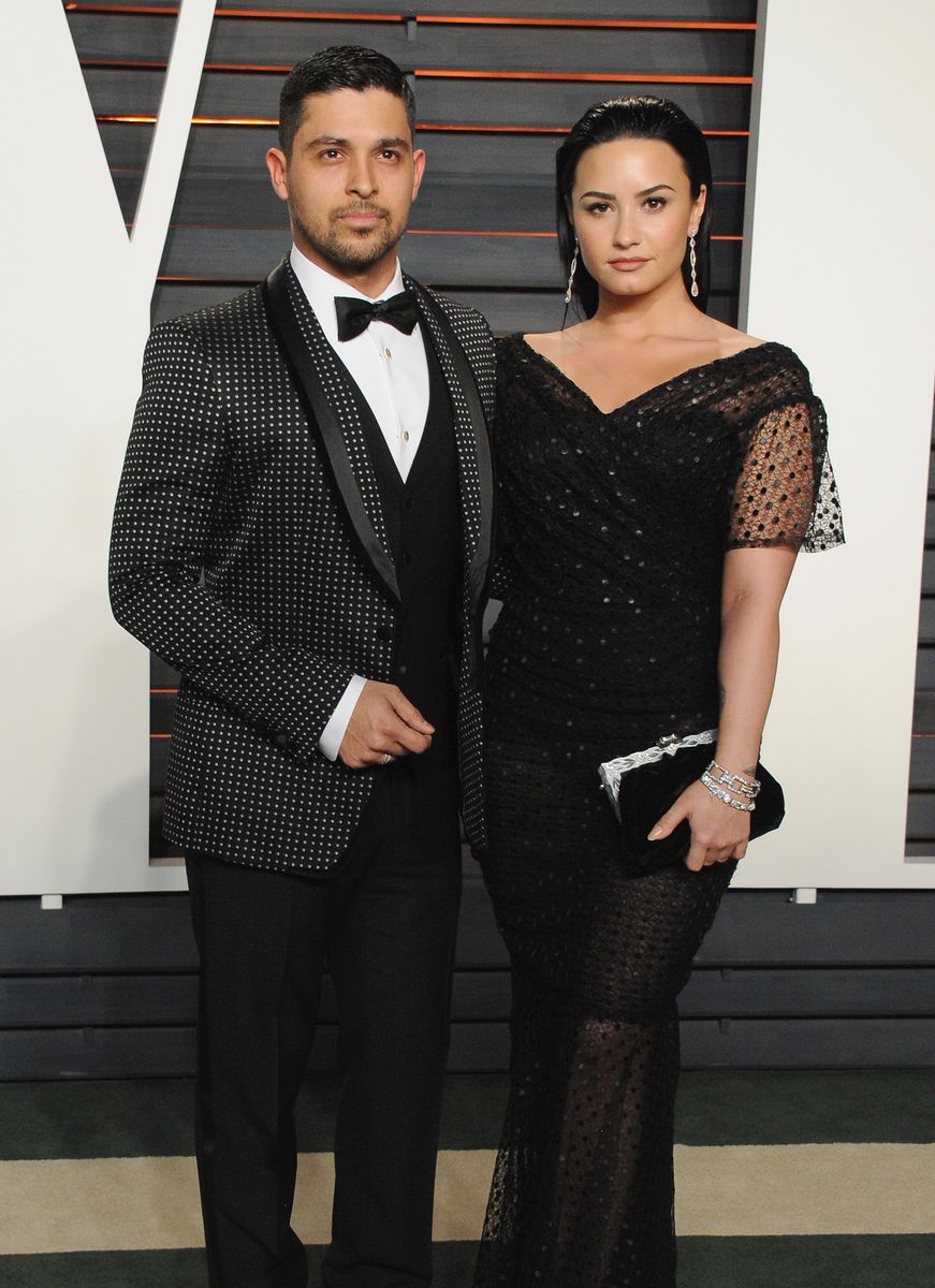  Actor Wilmer Valderrama and singer Demi Lovato arrive at the 2016 Vanity Fair Oscar Party Hosted By Graydon Carter at Wallis Annenberg Center for the Performing Arts on February 28, 2016 in Beverly Hills, California.  (Photo by Jon Kopaloff/FilmMagic)