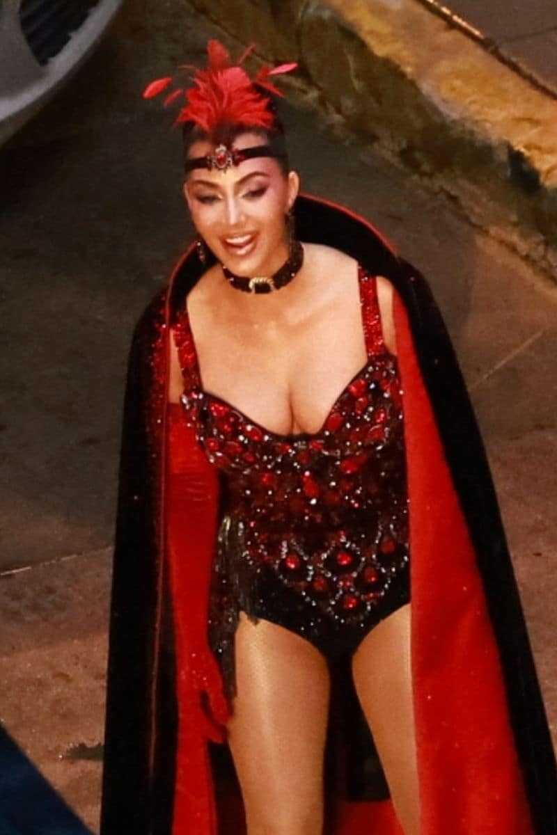  Kim wore a dazzling showgirl corset covered in bling, while Will portrayed Brad La Cadabra the Amazing Amazement.