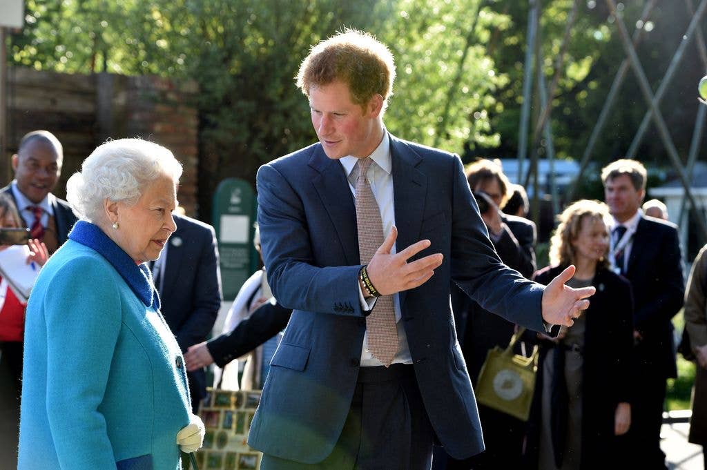 Queen Elizabeth II and Prince Harry attend the annual Chelsea Flower show at Royal Hospital Chelsea