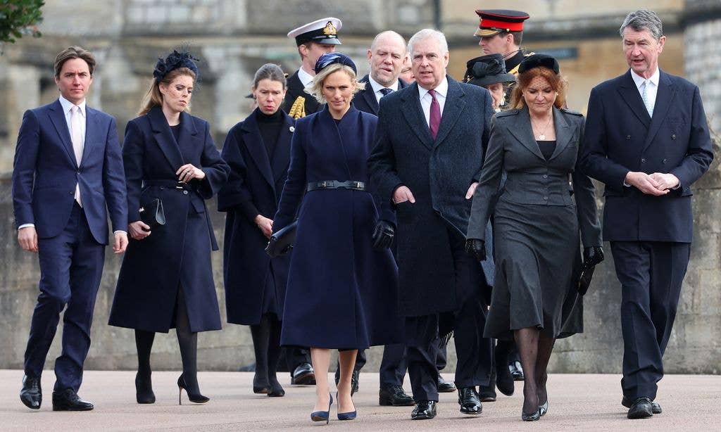 Edoardo Mapelli Mozzi (L), Britain's Princess Beatrice of York (2L), Zara (C) and Mike Tindall, Britain's Prince Andrew, Duke of York (5R), Britain's Princess Anne, Princess Royal (obscured), Sarah, Duchess of York (2R) and Vice Admiral Timothy Laurence arrives to attend a thanksgiving service for the life of King Constantine of the Hellenes, at St George's Chapel