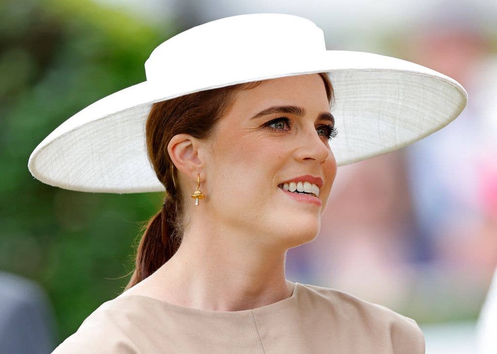 Princess Eugenie in a cream hat and tan dress