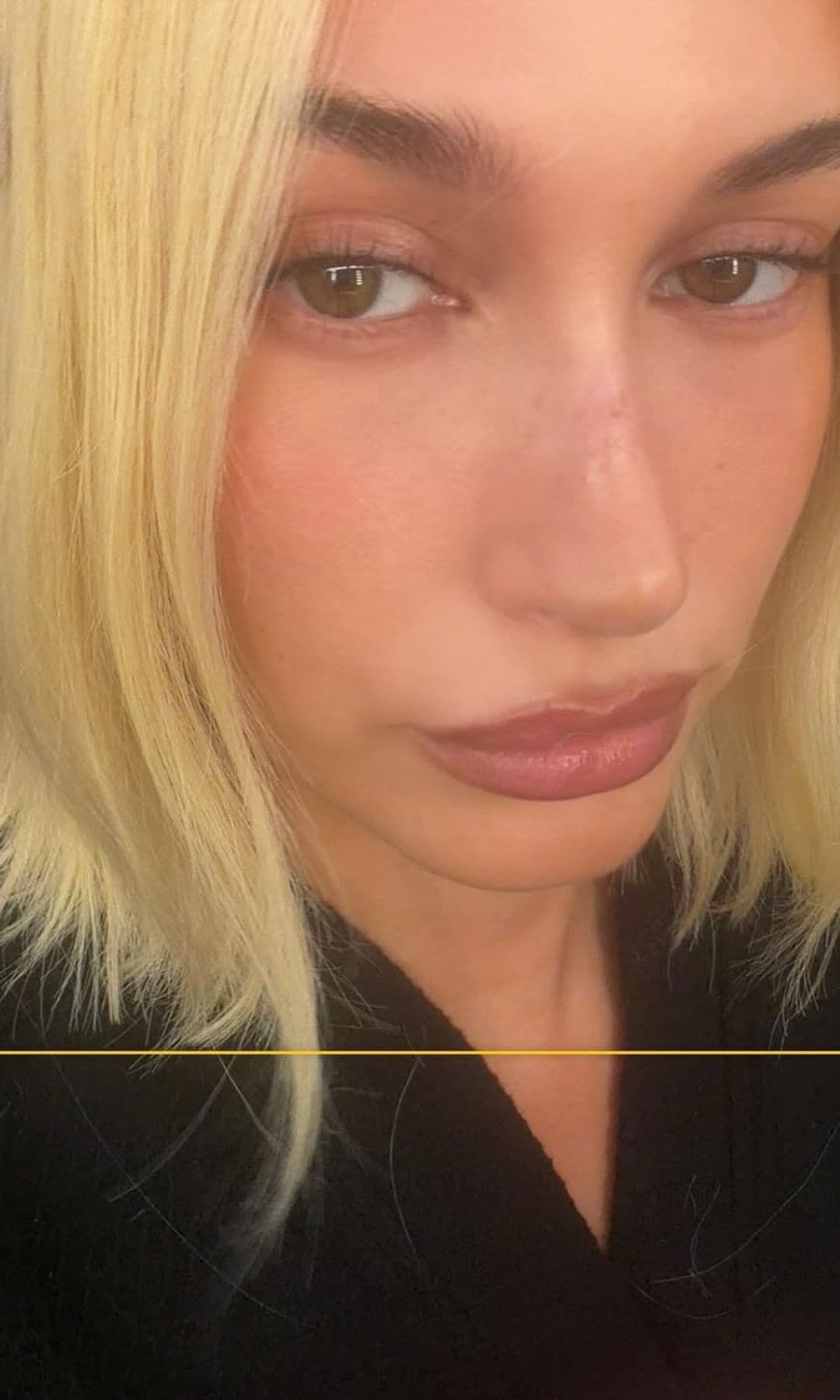 Bieber teased a blonde hairstyle that might have been a wig or might have been a new look