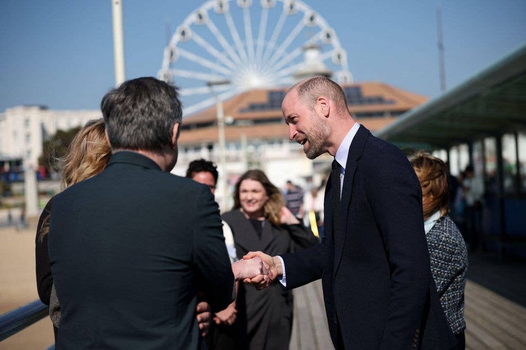 The Prince of Wales (right) meets delegates during a visit to see Homewards' ground-breaking youth homelessness work at Bournemouth Pier, in Bournemouth, Dorset. The Prince is joining international delegations from Australia, Canada, Belgium, the Netherlands and Finland who have travelled to the UK to see Homewards' work in action. Picture date: Thursday March 19, 2026.