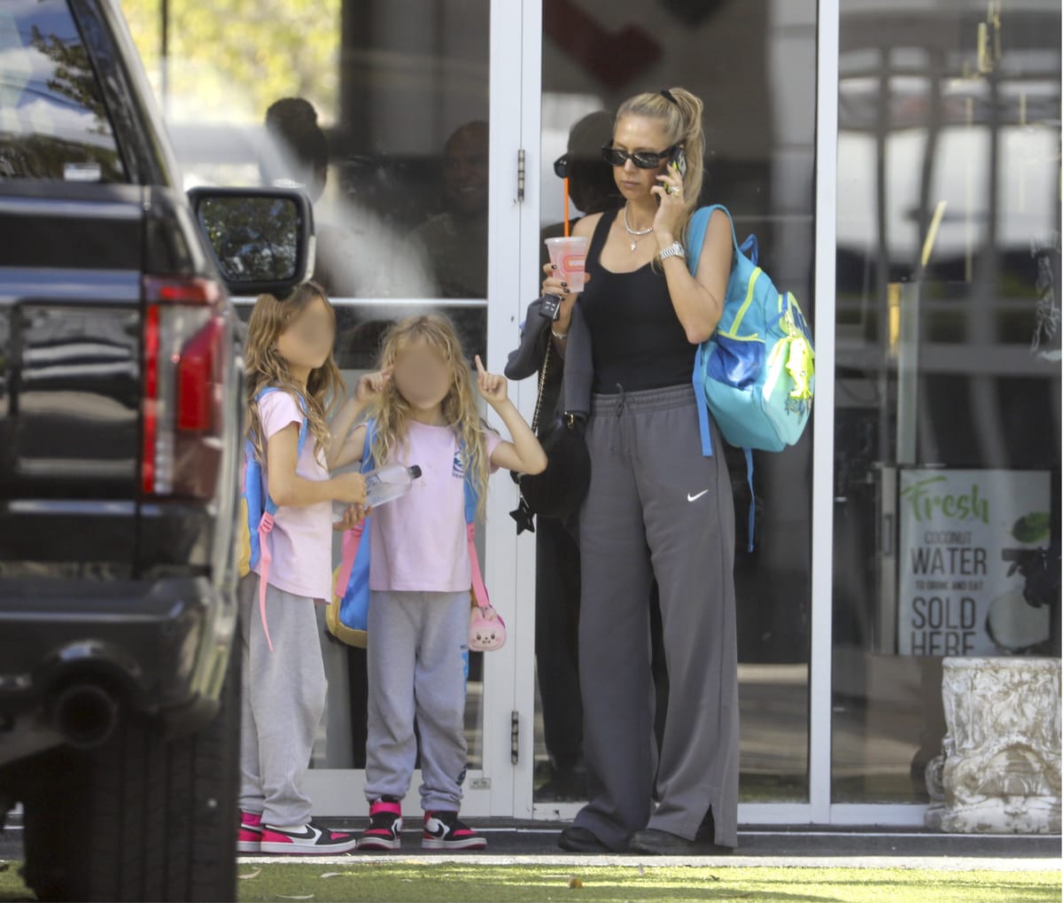Anna Kournikova spotted with her daughters, making silly faces and in adorable matching outfits