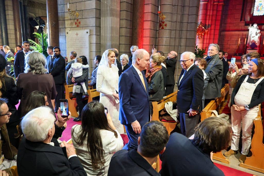 Princess Charlene and Prince Albert look on at the Cathedral of the Immaculate Conception during the Pope Leo XIV visit to Monaco