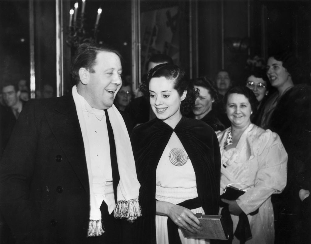 Charles Laughton and Elsa Lanchester arriving at a premiere