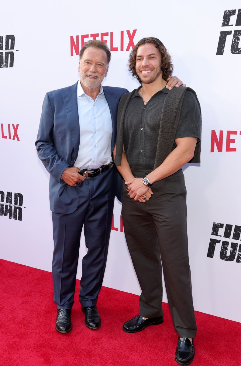 Arnold Schwarzenegger and Joseph Baena attend Netflix's "FUBAR" Season 2 Los Angeles Premiere.