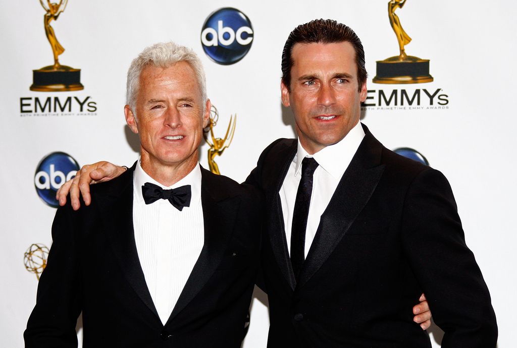 John Slattery and Jon Hamm pose in the press room during the 60th Primetime Emmy Awards