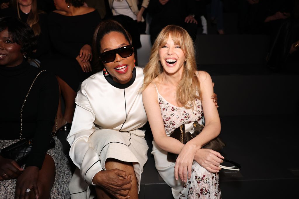 Oprah Winfrey and Kylie Minogue sitting front row
