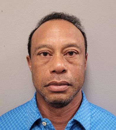 Tiger Woods poses for his booking photo after his arrest on March 27, 2026, in Stuart, Florida