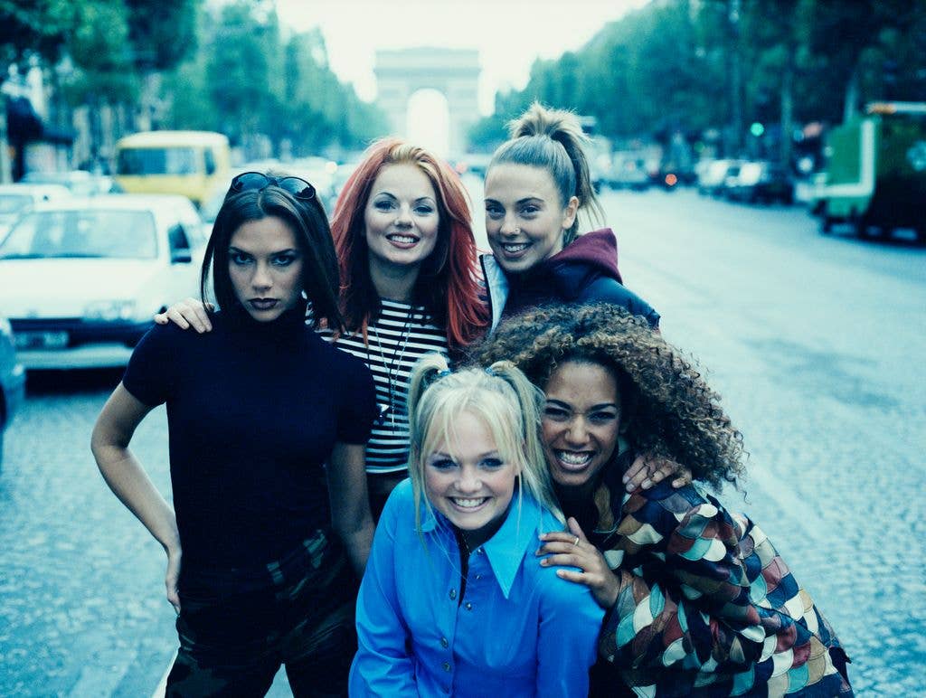 English pop girl group The Spice Girls in Paris, September 1996. Clockwise, from front: Emma Bunton ('Baby Spice'), Victoria Beckham ('Posh Spice'), Geri Halliwell ('Ginger Spice', Melanie Chisholm ('Sporty Spice') and Melanie Brown ('Scary Spice'). (Photo by Tim Roney/Getty Images)