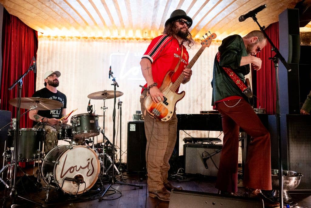 Jason performing with his band Oof Tatata