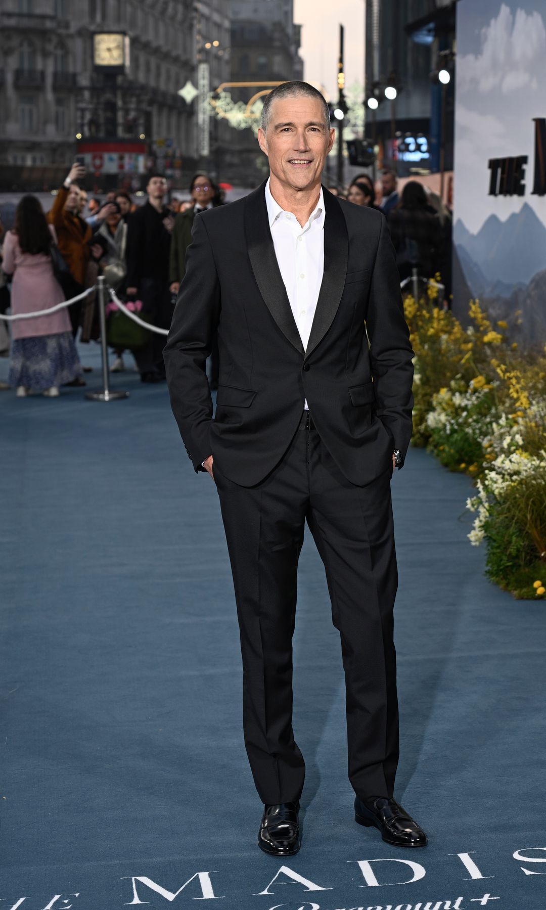 Matthew Fox wearing a black suit