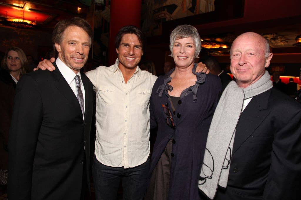 Kelly with producer Jerry Bruckheimer, Tom Cruise, and Tony Scott 