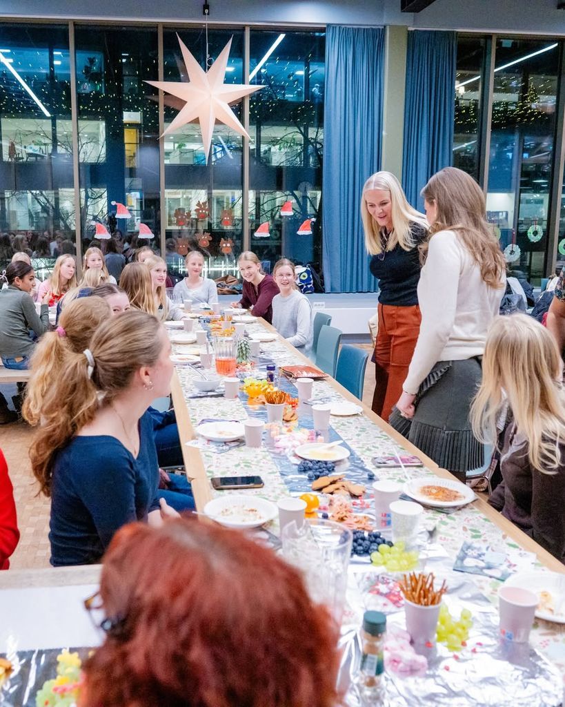 Mette-Marit of Norway with the Norwegian Girls’ Choir in December 2025, before the latest documents linking her to Jeffrey Epstein were released.