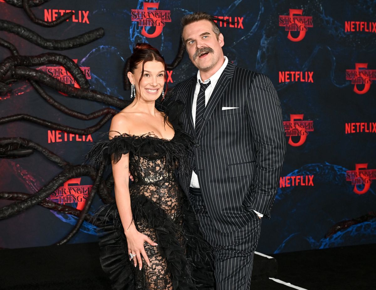 Millie Bobby Brown and David Harbour at the "Stranger Things" Season 5 World Premiere held at the TCL Chinese Theatre on November 06, 2025 in Los Angeles, California. (Photo by Michael Buckner/Variety via Getty Images) 