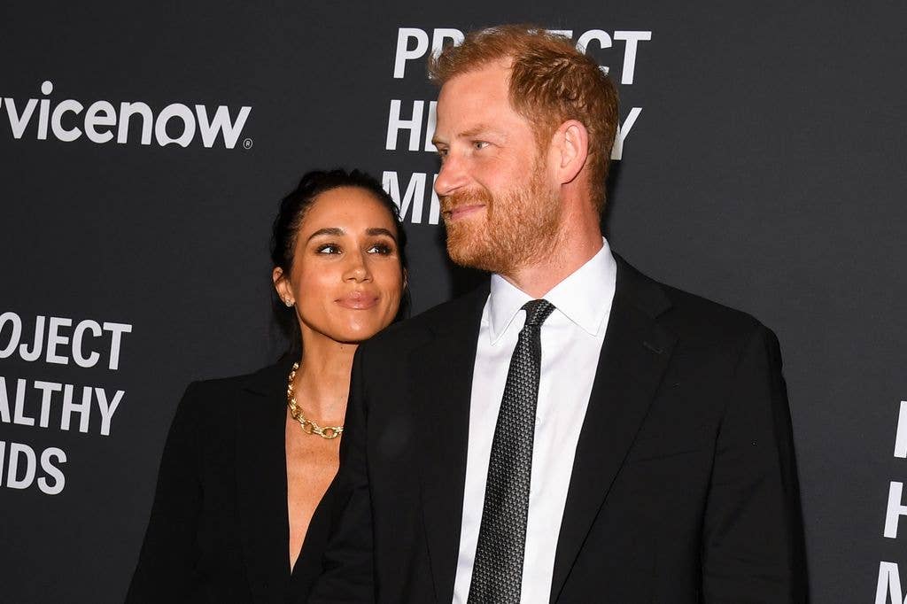Meghan Markle looking lovingly up at Prince Harry