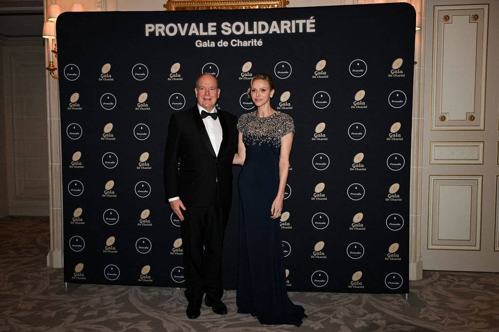 Princess Charlene and Prince Albert II of Monaco pose in formal dress