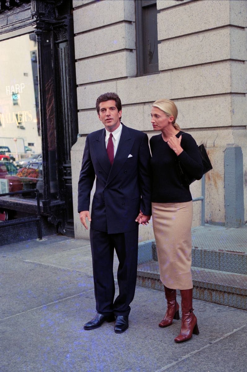 Meghan Markle's ensemble mirrored an outfit Carolyn wore in 1996 during a public appearance with JFK Jr. outside their Tribeca apartment. 