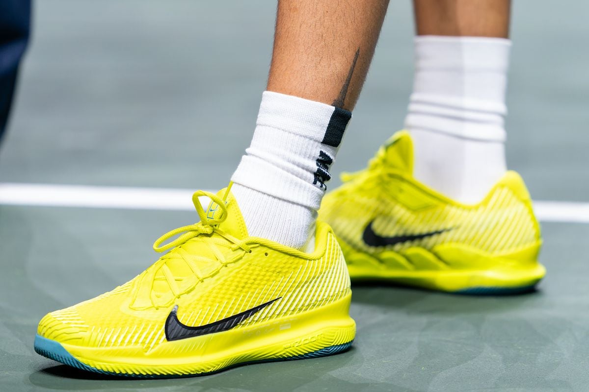 A detailed shot of Carlos Alcaraz's tattoo of the Eiffel Tower.