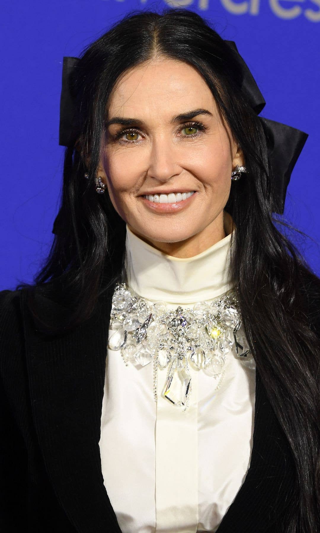 Demi Moore sports a big black bow at the 36th Annual Palm Springs International Film Festival Film Awards