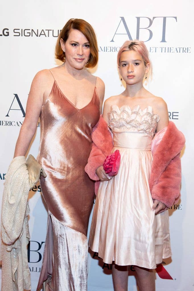 Molly Ringwald in a pink slip dress and daughter Adele Gianopoulos.