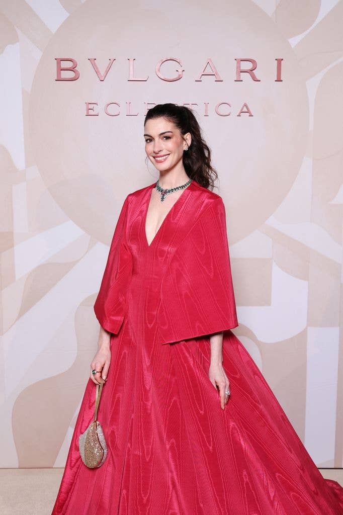 photo of anne hathaway in big red gown bulgari event