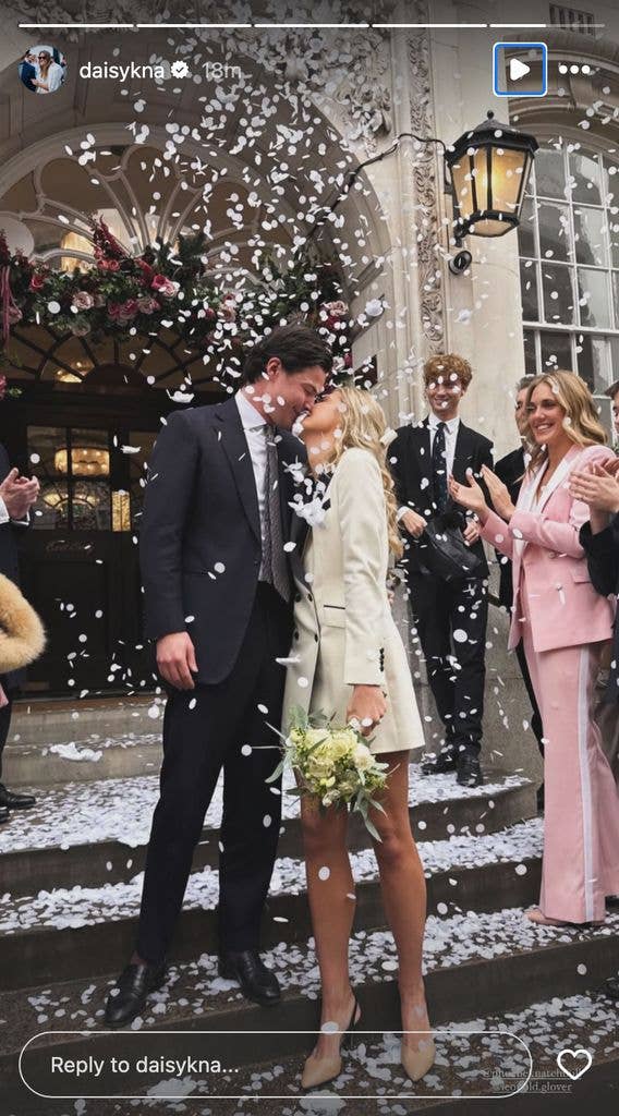 Phoebe Knatchbull kissing Leopold Glover after their wedding