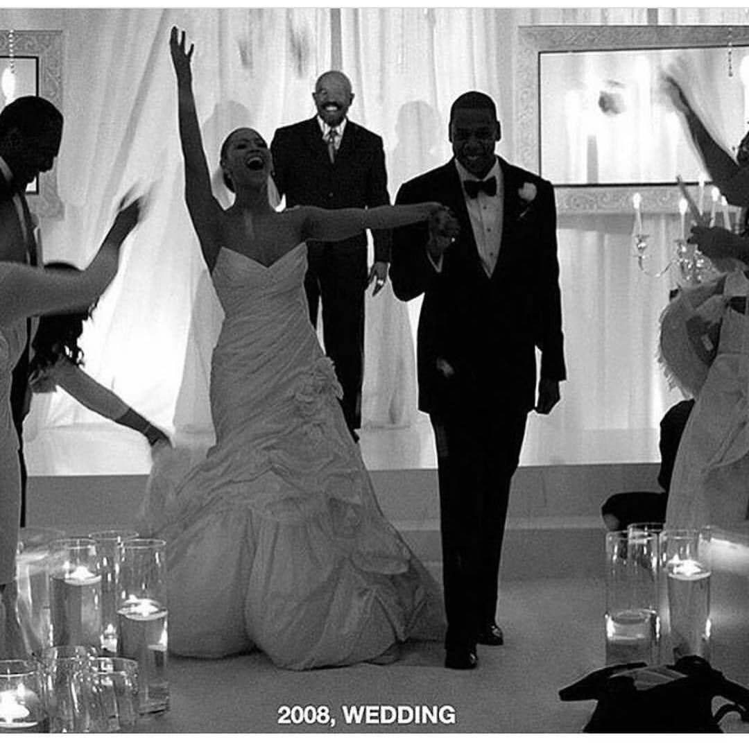 photo of beyonce and jay z walking down the aisle after wedding