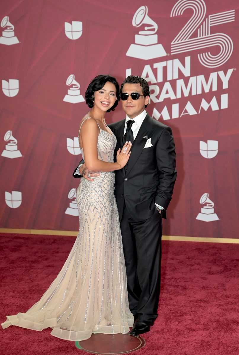 From a harrowing crossfire encounter to wedding delays—Christian Nodal isn't holding back in his latest interview. Read why he and Ángela Aguilar are hitting 'pause' on their religious ceremony.