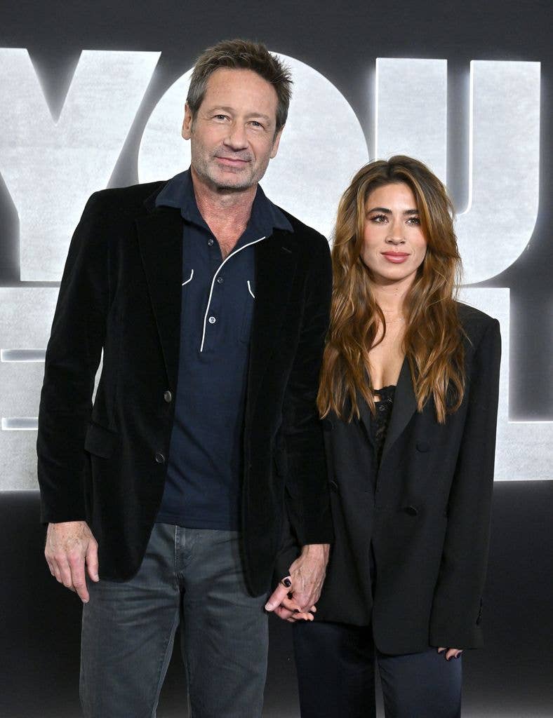 David Duchovny and Monique Pendleberry attend the Los Angeles Premiere of Netflix's "You People" at Regency Village Theatre on January 17, 2023 